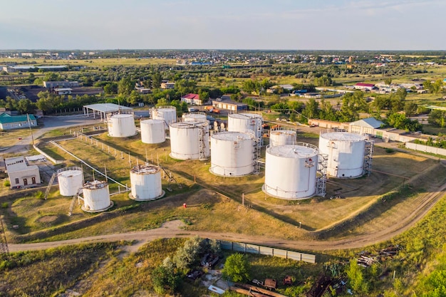 Tanks with petroleum products are among fields near the village The view from the top aerial view