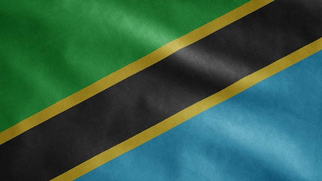 Tanzanian flag waving in the wind. Close up of Tanzania template blowing, soft and smooth silk. Cloth fabric texture ensign background.