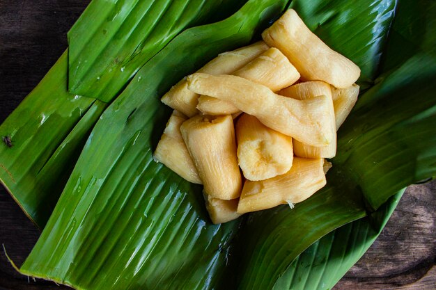 tapai or tape or peuyeum are traditional foods snacks from indonesia made from fermented cassava Served on banana leaf