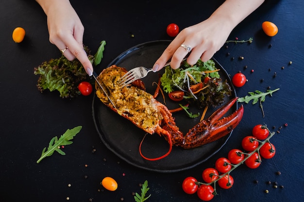 Tasting restaurant stuffed lobster dish