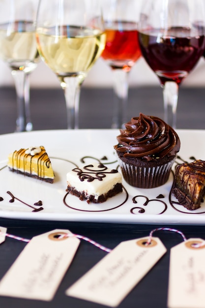 Tasting of wine and pattie chocolate pastries.