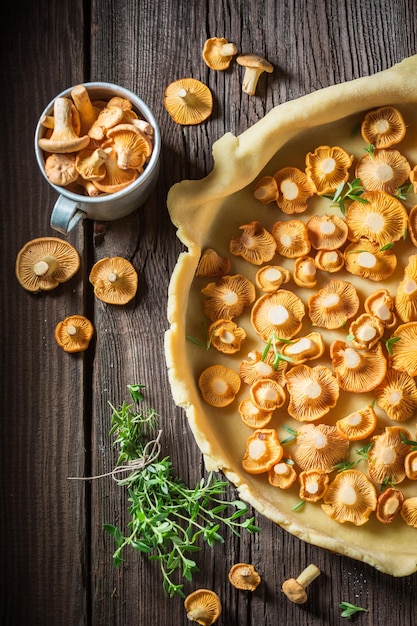 Tasty and aromatic pie with noble mushrooms and thyme