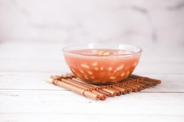 Tasty baked beans in a bowl on table