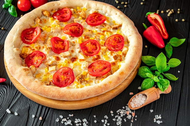 Tasty and big pizza with different types of meat