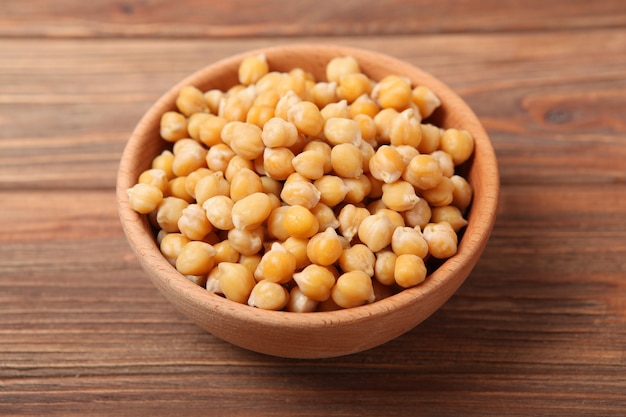 Tasty boiled chickpeas on the table closeup