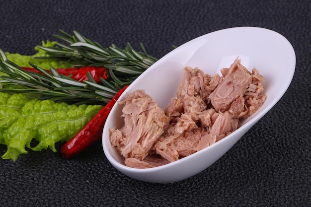 Tasty canned tuna fish in the bowl