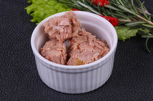 Tasty canned tuna fish in the bowl