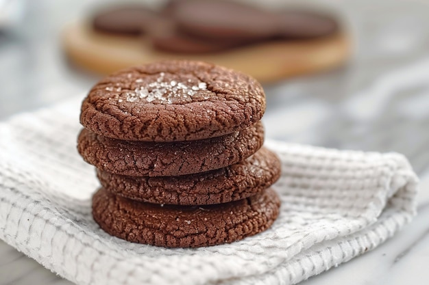 Tasty chocolate biscuits on white towel