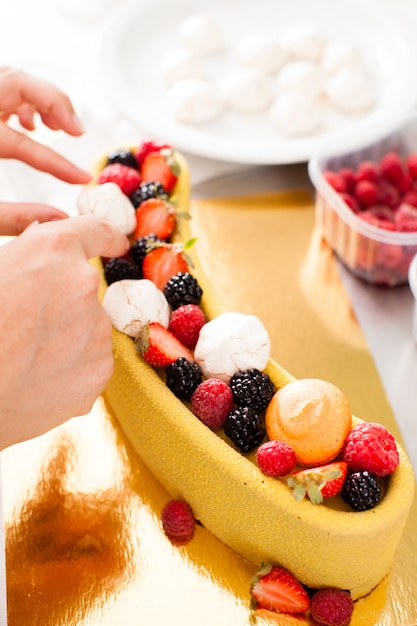 Tasty colorful cake with fresh summer berries