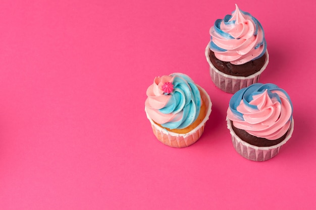 Tasty  cupcakes closeup background with copy space. Birthday party sweets