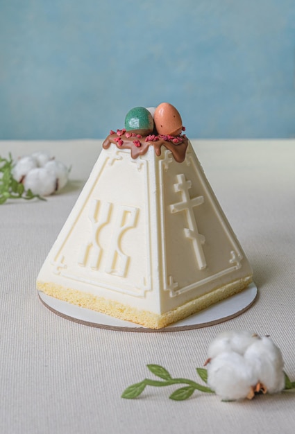 Tasty curd or souffle Easter cake with chocolate decor and eggs