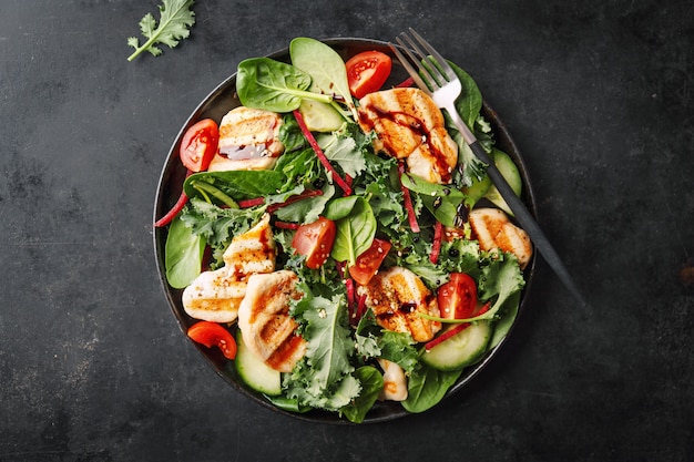 Tasty fresh salad with chicken and vegetables