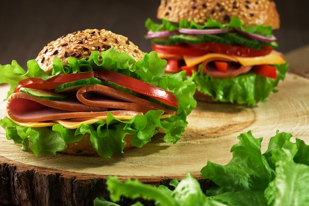 Tasty and fresh sandwiches on a  wooden table