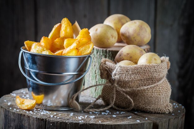 Tasty gold chips with salt made of fresh potato