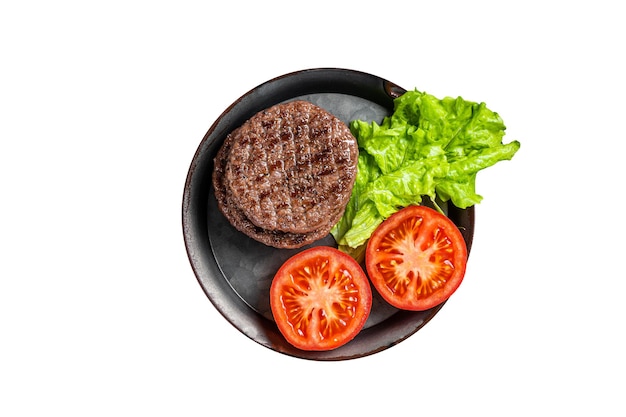 Tasty grilled burger beef patty with tomato spices and lettuce in kitchen tray Isolated on white background