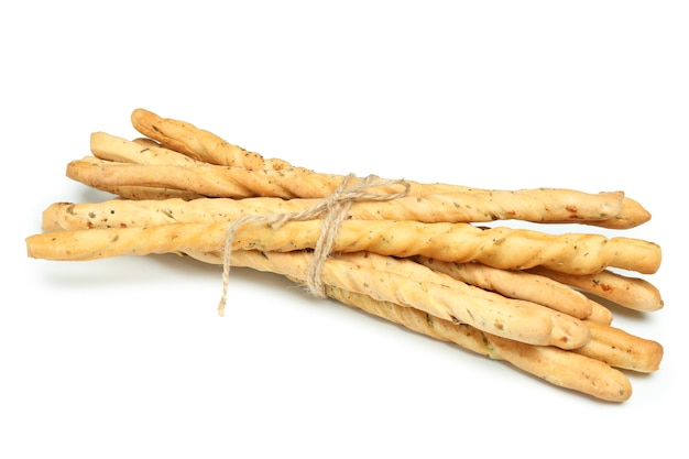 Tasty grissini breadsticks isolated on white