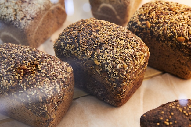 tasty homemade rectangular black bread with seeds