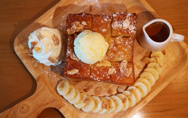 Tasty Honey Toast Topped with Ice Cream and Fresh Banana Slices