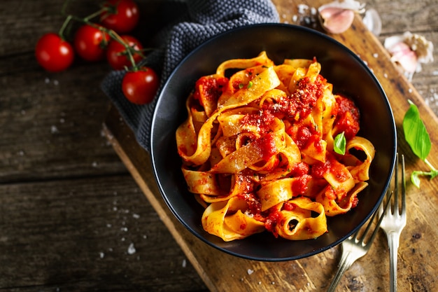 Tasty italian pizza with tomato sauce and parmesan 