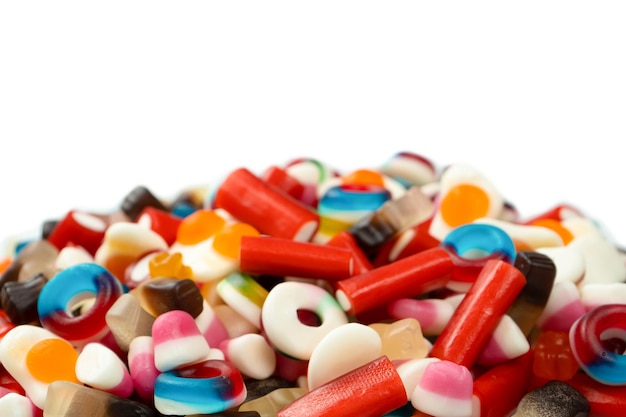 Tasty mix of jelly colorful candies isolated on a white background