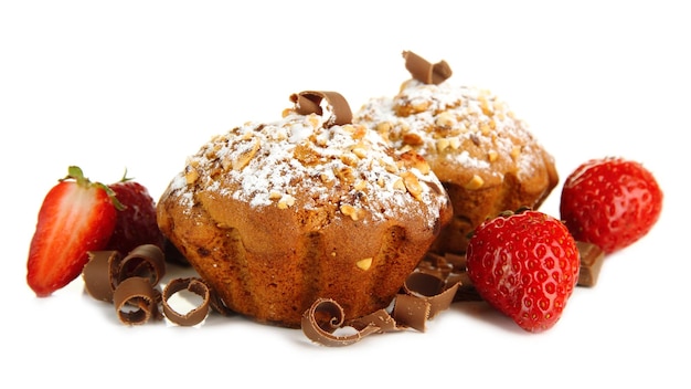 Tasty muffin cakes with strawberries and chocolate isolated on white