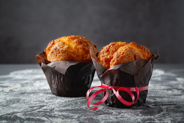 Tasty muffin closeup on dark background