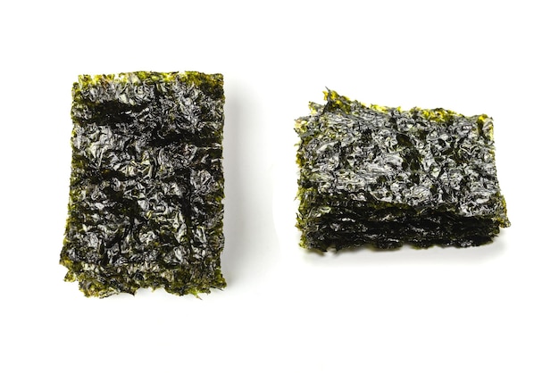 Tasty nori seaweed isolated on white