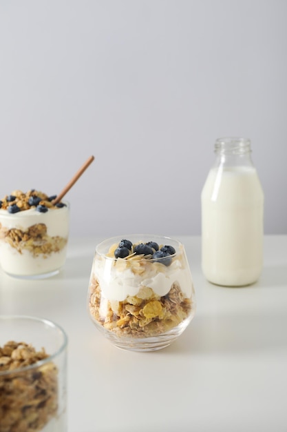 Tasty and nutritious breakfast concept - muesli with yogurt