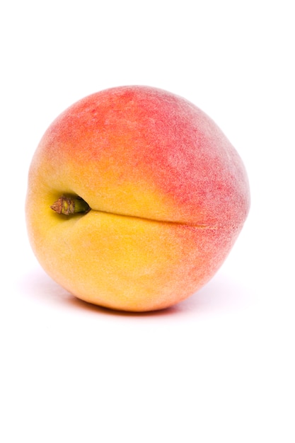 Tasty peach on white