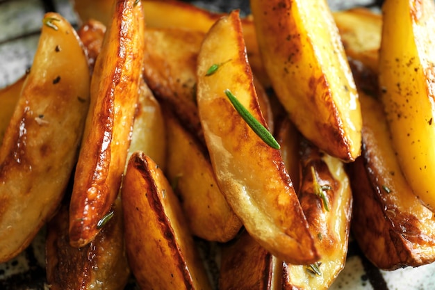 Tasty potato wedges, closeup