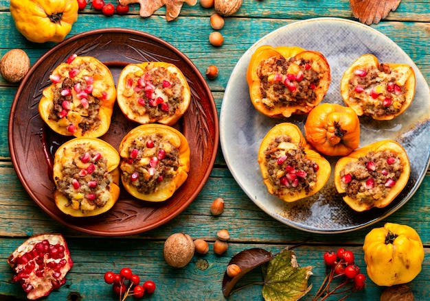 Tasty quince baked with minced meat and pomegranate