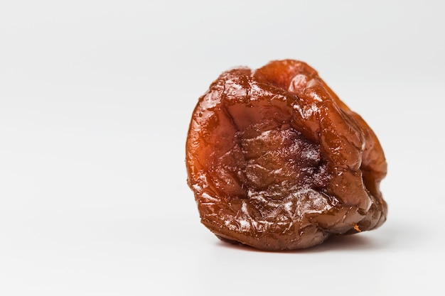 Tasty raisin on white background