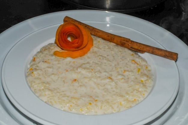 Tasty rice pudding flavored with orange and cinnamon