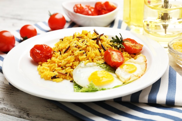 Tasty rice served on table closeup