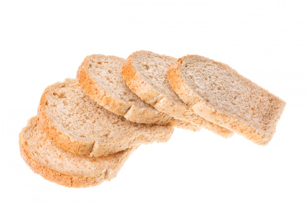 Tasty sliced fresh bread pieces isolated on white