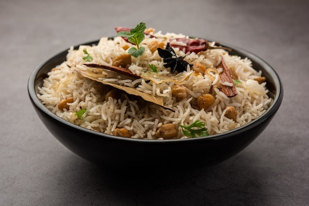 Tasty Spicy Chana Pulao or Pulav or pilaf cooked with Basmati Rice and Chickpeas black or white chickpeas with spices