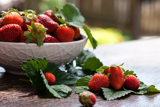 Tasty summer fruits on a wooden table.