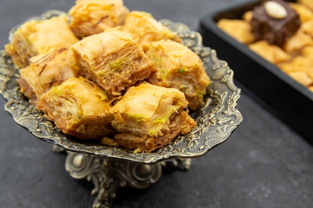 Tasty sweet Baklava on a decorative plate