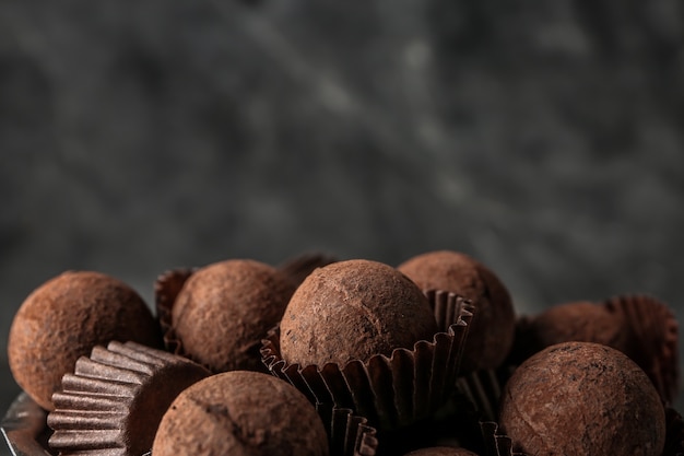 Tasty sweet chocolate truffles, closeup