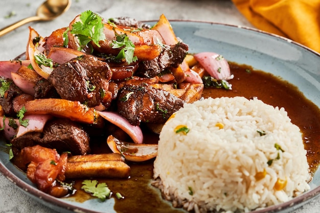 Tasty traditional Peruvian dish Lomo Saltado