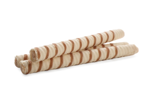 Tasty wafer roll sticks on white background Crispy food