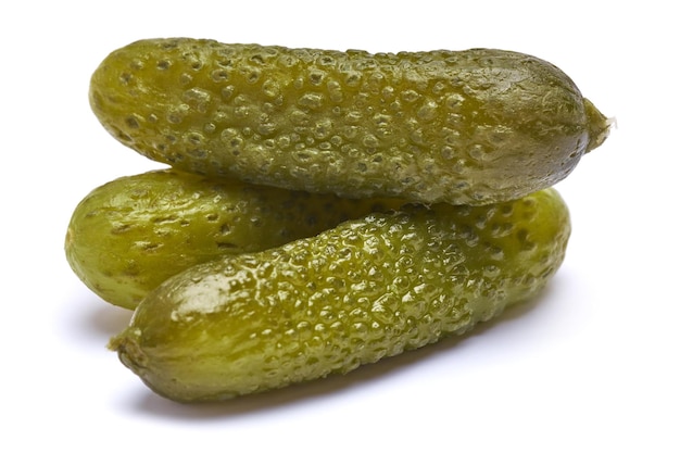 Tasty Whole green cornichon isolated on a white background. High quality photo