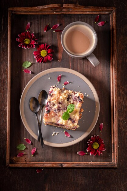 Tasty yeast cake made of fruits and icing