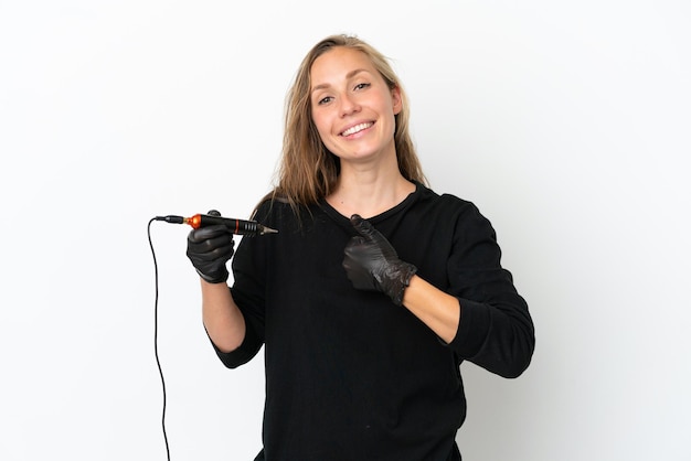 Tattoo artist woman isolated on white background giving a thumbs up gesture