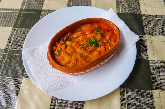 Tavche gravche baked beans traditional Macedonian dish on a table