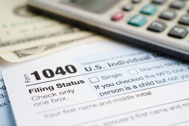 Tax form 1040 US Individual Income Tax Return business finance concept