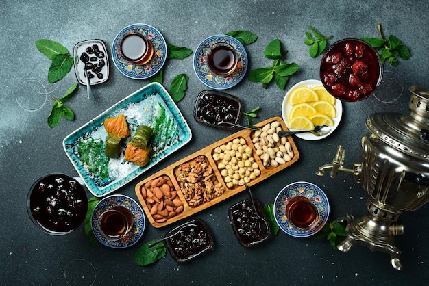 Tea ceremony Azerbaijani traditional serving of tea Tea dried fruits and nuts Top view