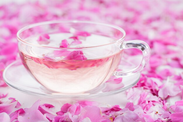 Tea with rose petals.Concept Holiday Valentine Day.