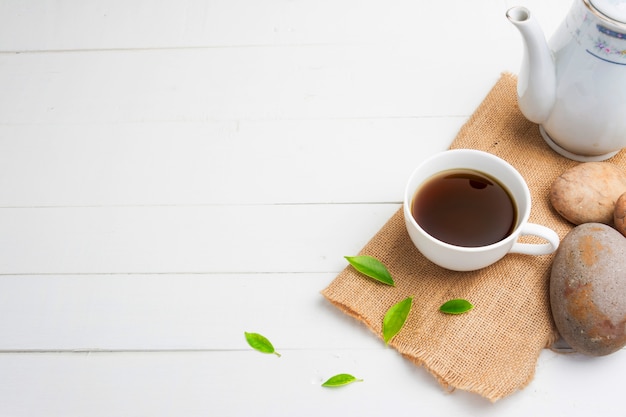 Tea with  Tea glass on white wood 