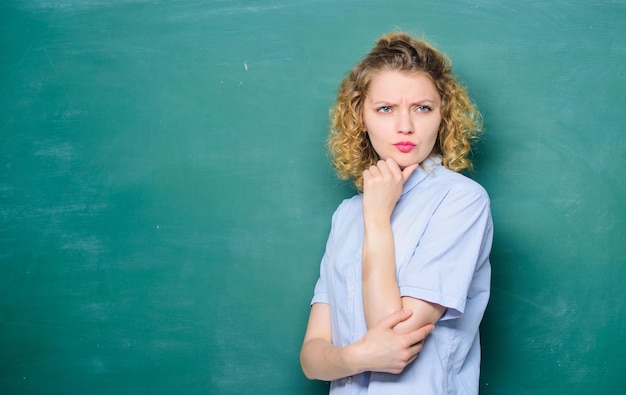 Teacher best friend of learners Good teacher is master of simplification Woman teacher in front of chalkboard Teacher explain hard topic Passionate about knowledge Teaching could be more fun